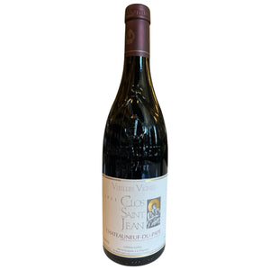 A bottle of CLOS SAINT JEAN 'VIEILLES VIGNES' CHÂTEAUNEUF-DU-PAPE 2023 from WINE: BORDEAUX FINE & RARE/A-VIN-GARDE, with a maroon foil top and white label featuring gold and black text plus a saint image.