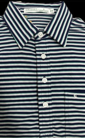 The CRIQUET Performance Players Shirt in Duval Stripe—Navy features neatly folded navy and white horizontal stripes, a collar, and a front pocket, showcased on a black background.