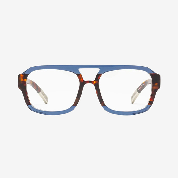 Eyeglasses with a blue top rim, tortoiseshell pattern on the lower frame and arms, and a distinctive keyhole bridge, shown on a plain white background.
