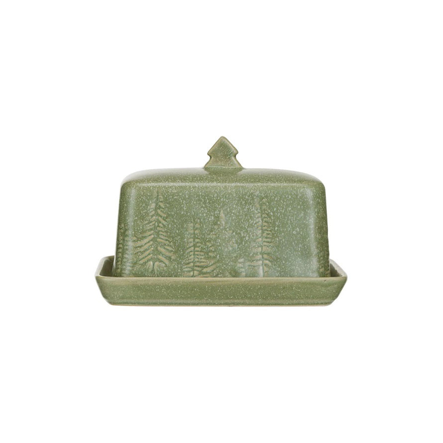 The DEBOSSED STONEWARE BUTTER DISH by CREATIVE COOP is a green stoneware butter dish that includes a lid adorned with embossed tree designs and features a small tree-shaped handle. It is expertly crafted from debossed stoneware and finished with a matte reactive glaze.
