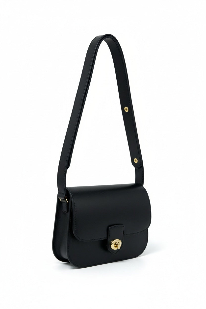 LE BORSETTE LEATHER HANDBAG IN BLACK: structured Italian leather shoulder bag with a gold-tone turn-lock closure and adjustable strap.