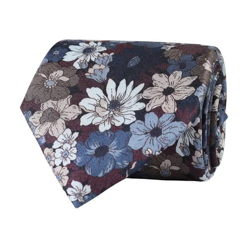 A rolled-up AMANDA CHRISTENSEN men’s luxury tie featuring a floral pattern in wine red melange, expertly crafted from premium silk twill for an elegant touch.