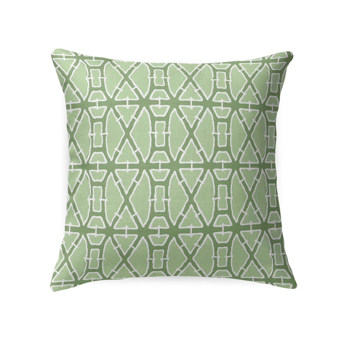 A woven rattan armchair features the LOOM & CLOTH Lattice Tailored Pillow in Green and sits beside a white nightstand with gold knobs, decorated with vases, against a blue wallpaper adorned with a gold leaf design.