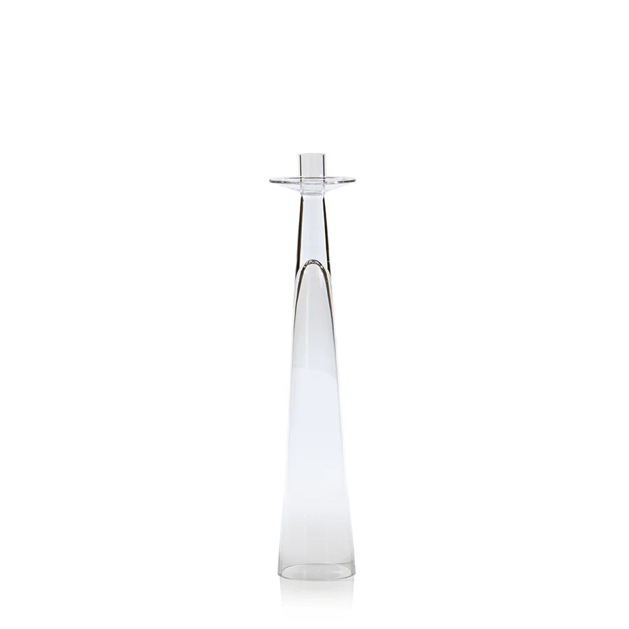 The ZODAX AMIN GLASS CANDLEHOLDER MEDIUM is a tall, clear glass holder with a sleek modern design, narrow base widening upwards, and a small top platform. Dimensions: 3.5 in x 15.75 in (8.89 cm x 40.01 cm).