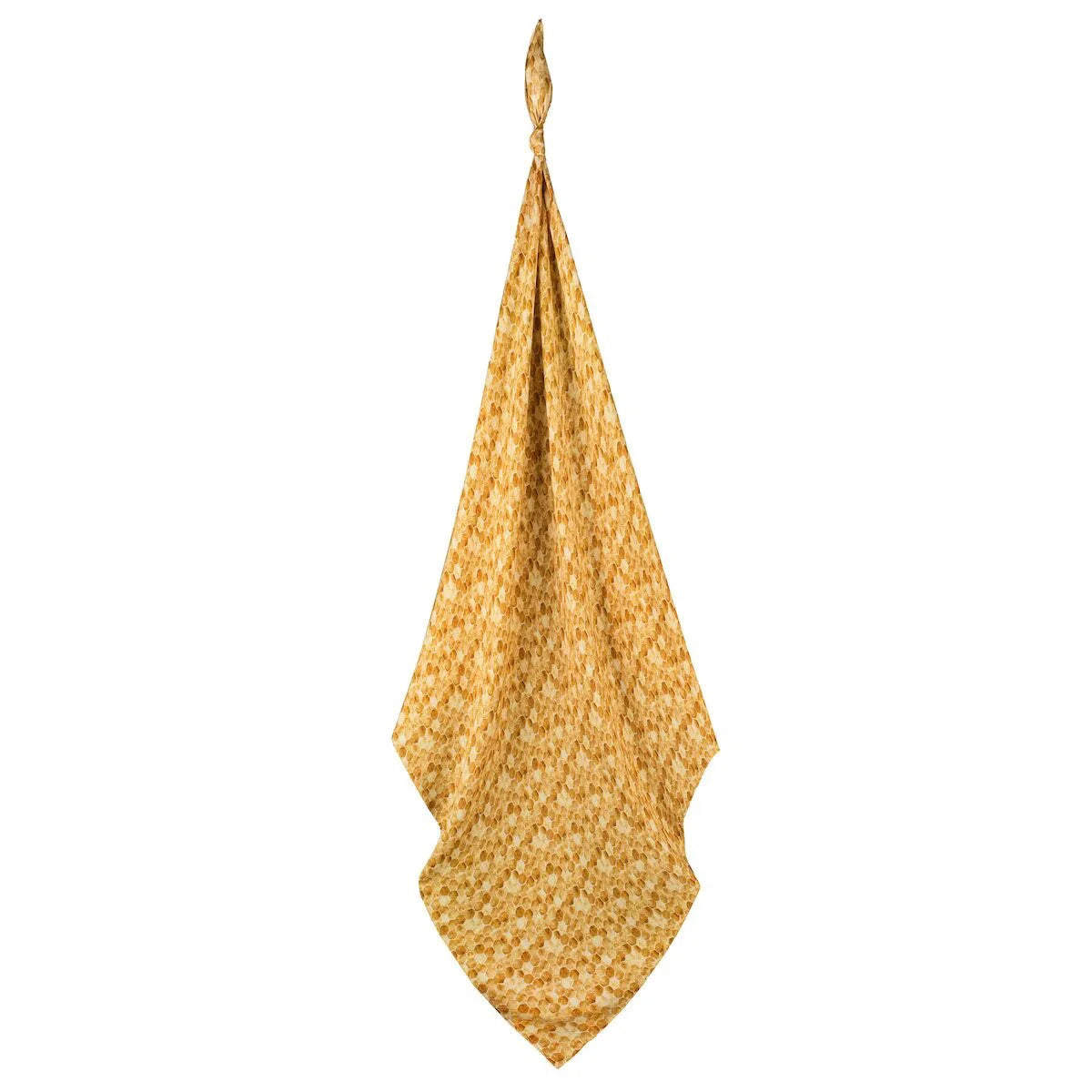 A yellow and orange patterned cloth, reminiscent of a HONEYCOMB SWADDLE from MILKBARN, is hanging with a complex geometric design. Gathered at the top, it cascades down in a triangular shape with a slightly wrinkled texture.
