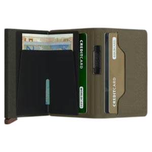 The SECRID - BANDWALLET LIBA® IN GREEN AND ORANGE by SECRID features an open, slim design with visible euro banknotes and three credit cards organized in dedicated slots. This wallet includes sections for both cash and cards and offers RFID protection to keep your information secure.