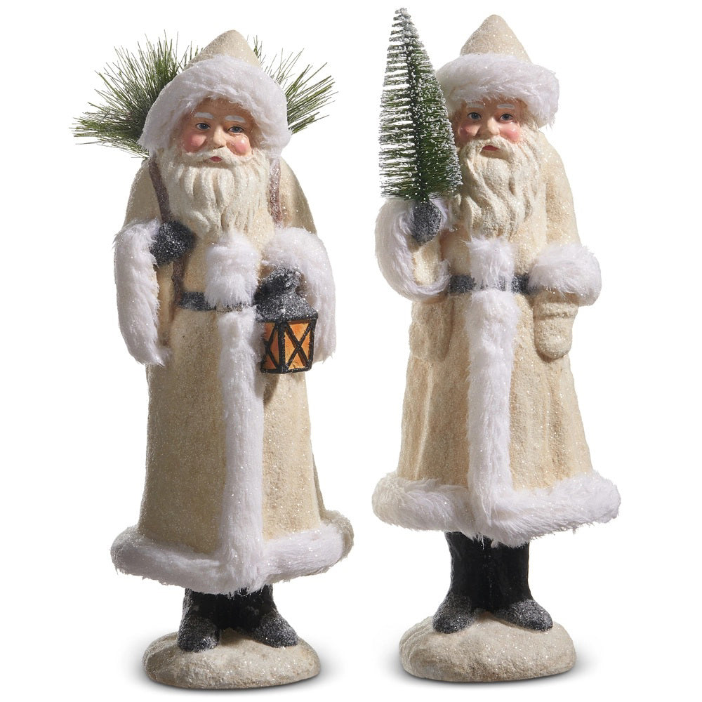 The RAZ IMPORTS IVORY OLD WORLD SANTA WITH PINE 15.5&quot; features a vintage-style Santa in a cream coat with white fur trim, white beard, and pointed hat, holding a pine tree—perfect for festive home decor.