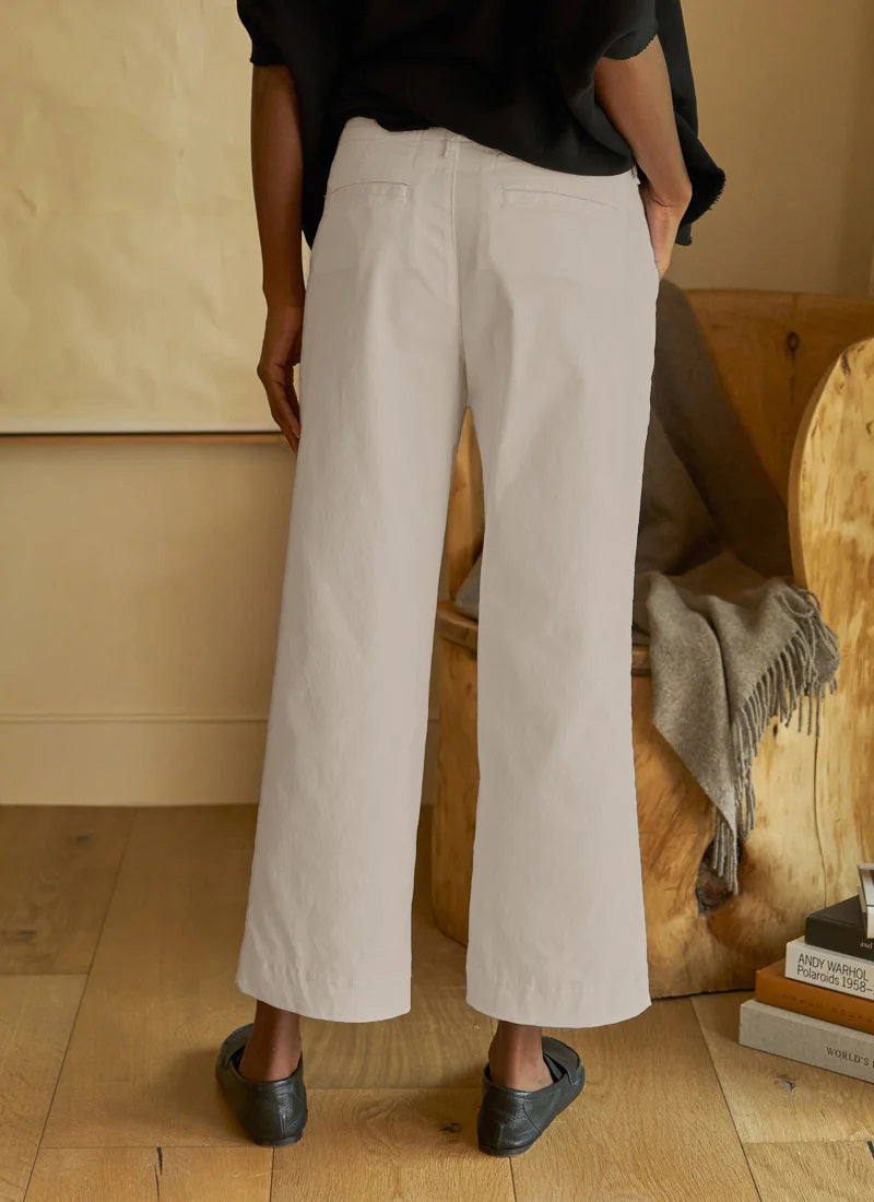 The FRANK &amp; EILEEN Westport Italian Wide Leg Chino in Cement features belt loops, side pockets, and a front zipper, shown laid flat on a white background.