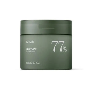 A green cylindrical container with a lid, labeled "ANUA HEARTLEAF 77% CLEAR PAD" in white text is featured. From KOSMIC KBEAUTY SKINCARE, it contains 160ml of heartleaf extract, renowned for anti-inflammatory benefits and minimizing pore size. Set against a plain white background.