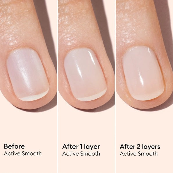 A bottle of MANUCURIST INC’s ACTIVE™ Smooth Ridge Filler Care Polish featuring a white cap and pale pink liquid. The label highlights its smoothing and evening effects, making it ideal for achieving the flawless finish of a French manicure.