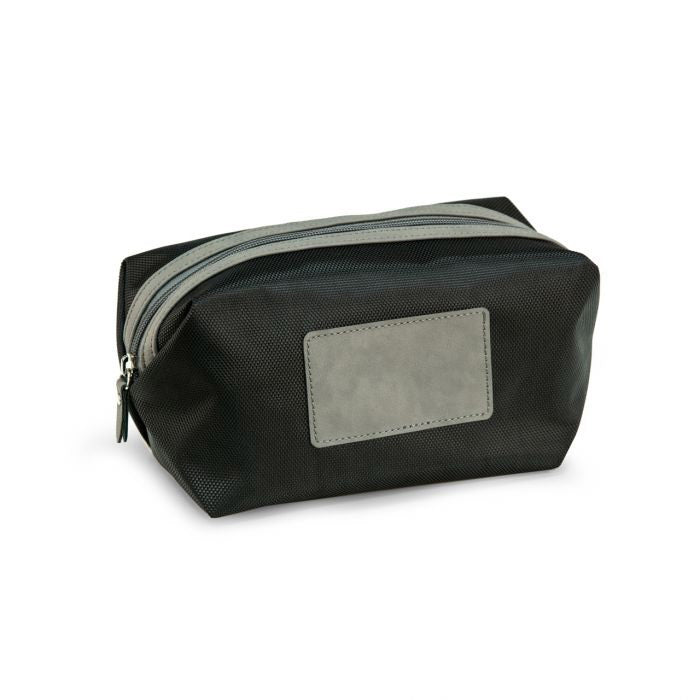 The BEYBERK INTERNATIONAL NYLON AND LEATHER DOPP KIT is a black, water-resistant toiletry bag with a light gray front patch and matching top zipper—perfect for travel.