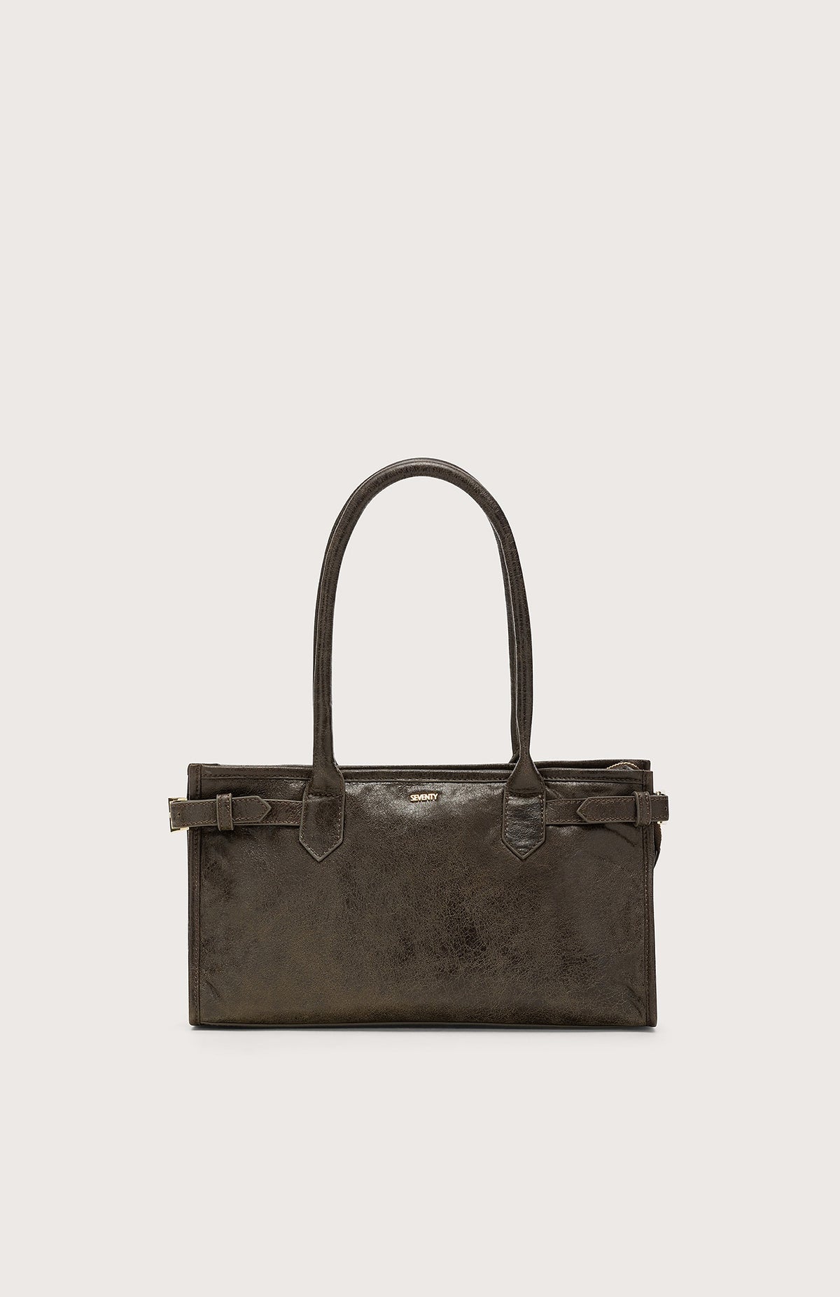 The SEVENTY VENEZIA Leather Handbag by SEVENTY is dark brown Italian leather, rectangular, with double handles, small side buckles, and a subtle front metallic logo, shown on a plain light background.
