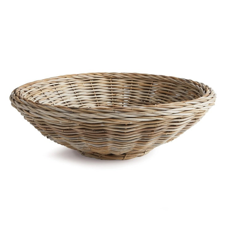 The NAPA HOME AND GARDEN - ELOISE DISPLAY BASKET is a shallow, round wicker basket with a natural woven design and wide open top. Crafted from light brown, tightly woven materials, it offers a rustic simplicity ideal for curated displays or as an elegant centerpiece.