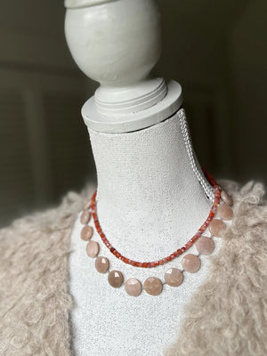 The ANN LIGHTFOOT Cube Carnelian Ras Du Cou Necklace features small, square red and pink beads in a single loop with a sterling silver clasp, shown on a white background.