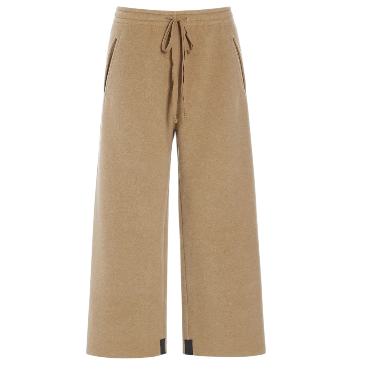 Here’s a rewritten version using your product data: A sizing guide chart for the HENRIETTE STEFFENSEN - FLEECE FLARED CROPPED TROUSER by HENRIETTE STEFFENSEN, featuring measurements for chest, waist, and hips in centimeters for sizes XS to XXL—including information specific to fleece pants and flared trousers—with separate charts for normal and loose fits, plus a diagram illustrating where to measure.
