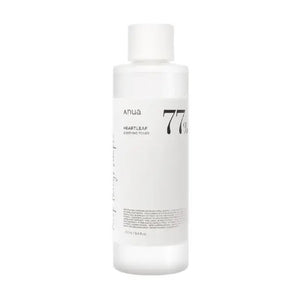 The ANUA HEARTLEAF 77% SOOTHING TONER by KOSMIC KBEAUTY SKINCARE comes in a white bottle with a simple label, ideal for sensitive skin. The product name and main ingredient percentage are clearly shown, complemented perfectly by a white cap for a minimalist look.