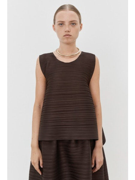 Close-up of MEIMEIJ Plisse Sleeveless Top&#39;s dark textured fabric displays a finely woven pattern. The consistent monochrome color and texture, with subtle weave variations, reflect minimalist elegance.