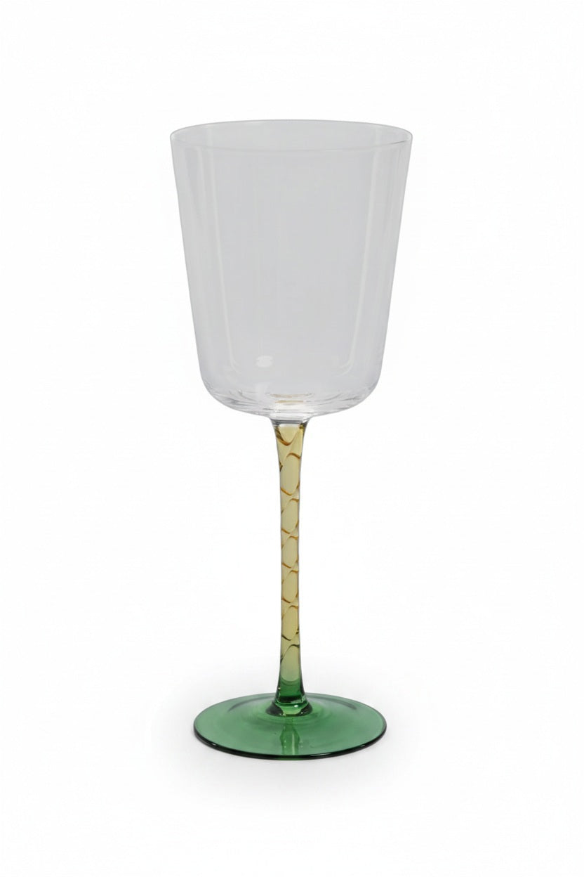 VICENZA GREEN AND AMBER RED WINE GLASS featuring a 9-inch clear bowl, a green base, and a 3.5-inch patterned amber stem.