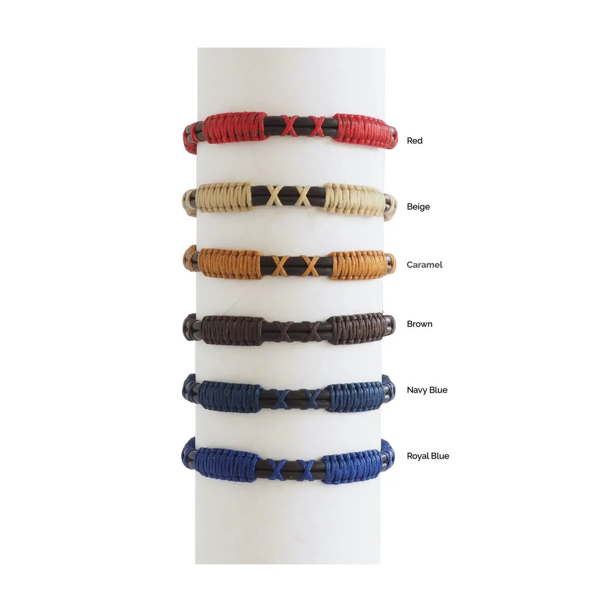 The MAKARLA MEN'S LEATHER ROPE BRACELET IN RED features a handmade design with an adjustable sliding knot closure, stylishly displayed on a white cylindrical stand and labeled with its color.