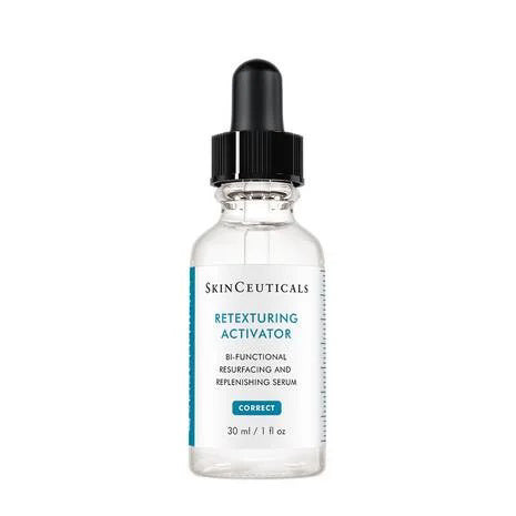 A 30 ml bottle of SKINCEUTICALS - RETEXTURING ACTIVATOR exfoliating serum with a black dropper cap. The label on the clear bottle indicates it&#39;s a bi-functional resurfacing and replenishing serum designed to support the skin barrier. The product is branded under the &#39;Correct&#39; category.