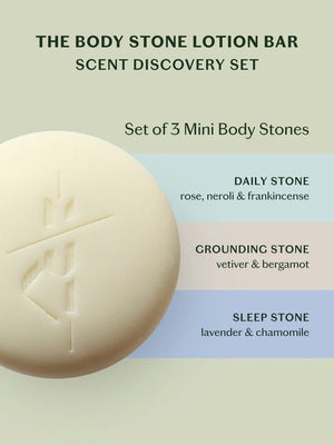 The KATE MCLEOD - THE ESSENTIAL COLLECTION MINI SAMPLER SET, featuring "The Body Stone," "Sleep Stone," and "Grounding Stone," is displayed against a light green background with three round stones in front and the brand box labeled behind.