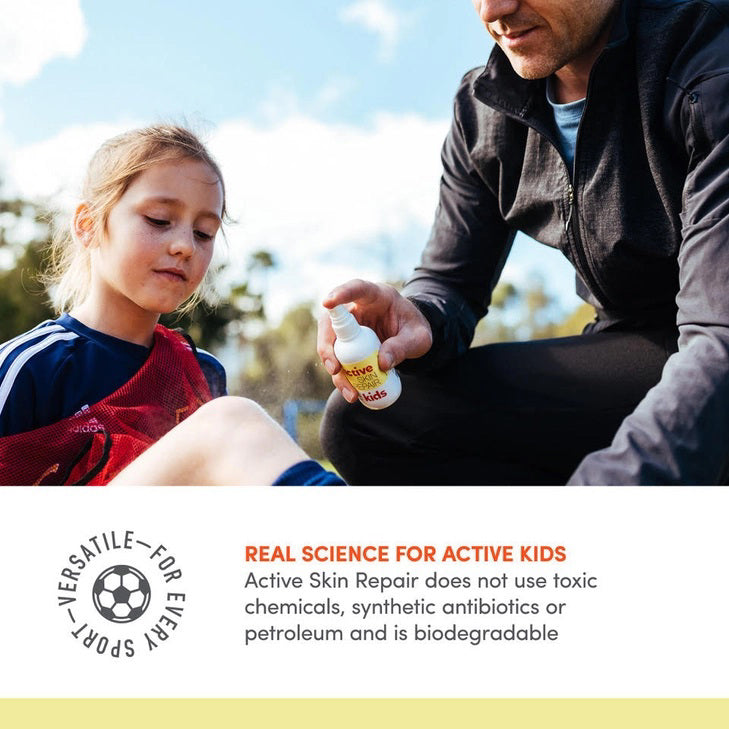 A yellow and white spray bottle labeled &quot;ACTIVE SKIN REPAIR - KIDS SPRAY&quot; is placed next to its matching box. This pediatrician-recommended, medical-grade spray from ACTIVE SKIN REPAIR kills 99.9% of bacteria, is sting-free, promotes natural healing, and serves as a non-toxic first aid spray for effective kids&#39; skincare.