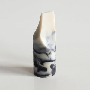 A rectangular marbled black and white UME - JASMINE YLANG YLANG ERODE MINI SOAP by UME STUDIO rests inside an open white box next to its matching lid on a plain white surface.