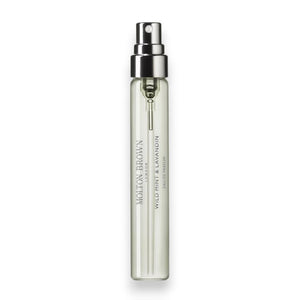A clear glass spray vial of MOLTON BROWN Wild Mint & Lavandin Eau de Parfum 7.5, featuring a silver nozzle and minimalist label with wild mint and lavandin design.