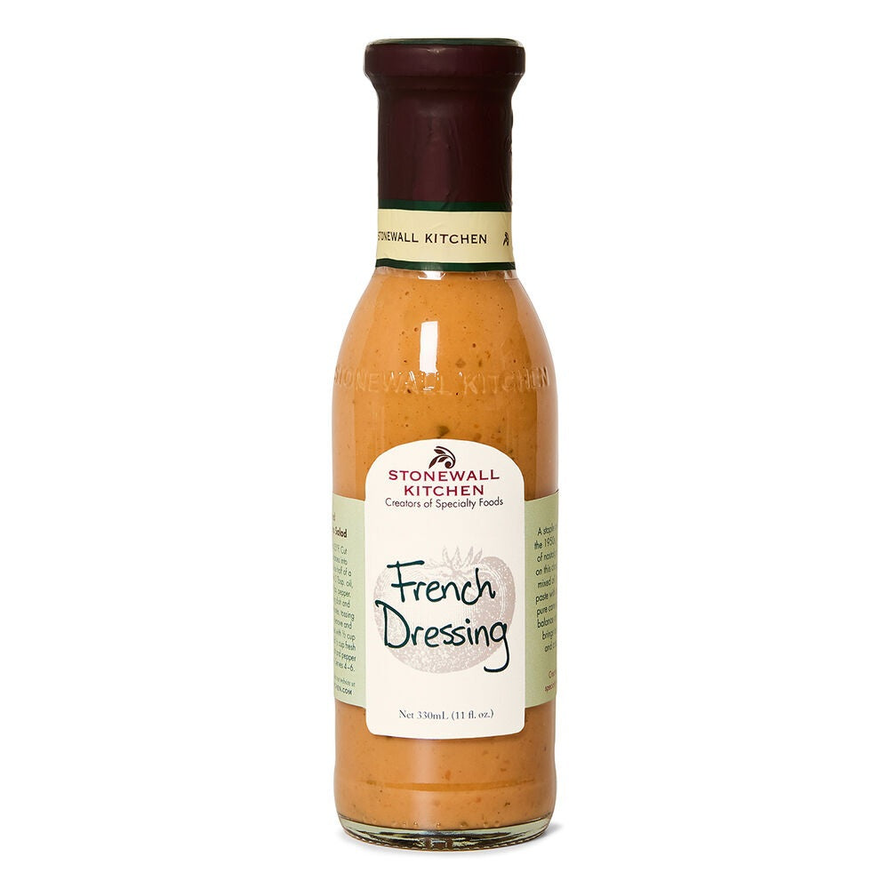 A bottle of STONEWALL KITCHEN - FRENCH DRESSING features a maroon cap and a cream-colored label with the product name and volume, delivering the classic, zesty tang of traditional French dressing to your table.