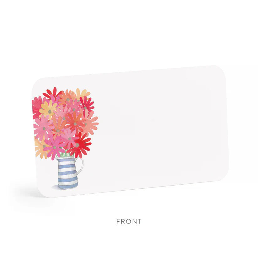 A clear plastic box of E. FRANCES PAPER's "Freshly Picked Little Notes" contains 85 notecards, each featuring a watercolor bouquet of pink and red flowers in a blue and white striped mug, labeled "E. Frances 85 Little Notes - use unsparingly.