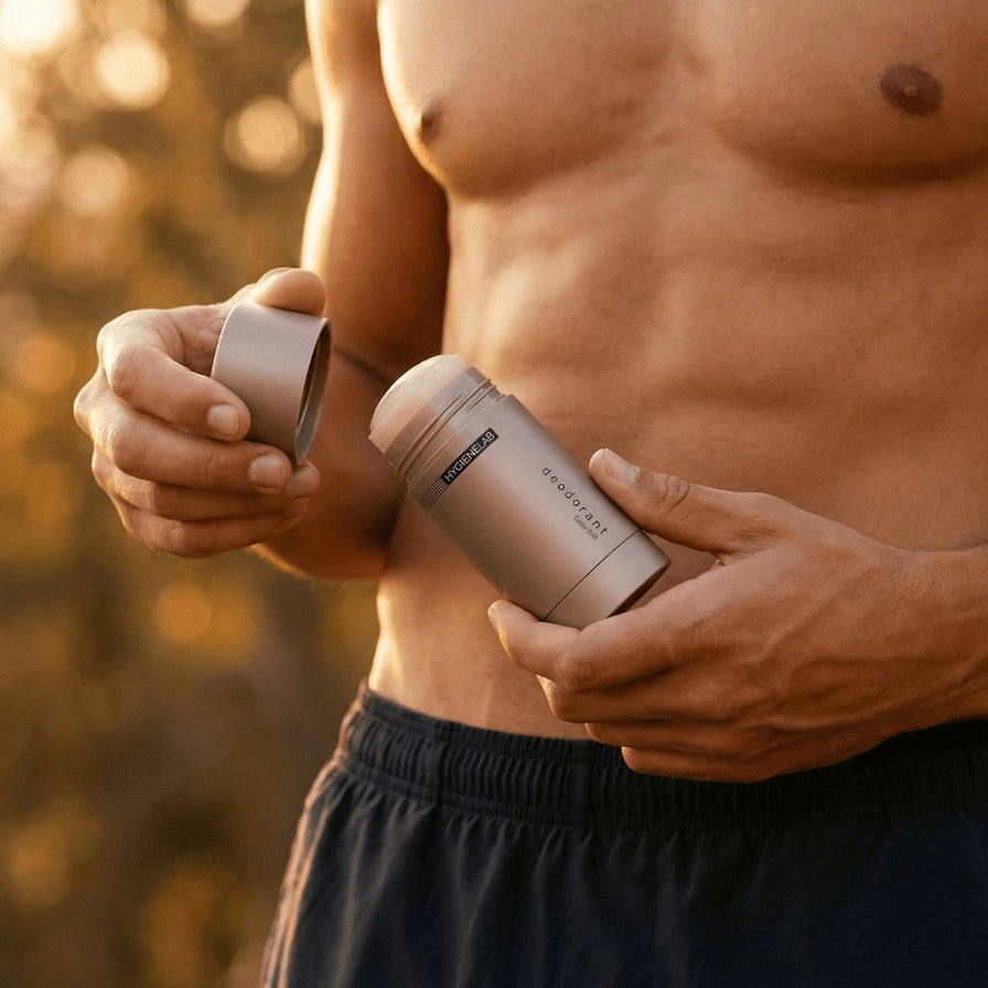 A beige cylindrical stick of HYGIENELAB - DEODORANT, UNSCENTED stands upright on a neutral background, featuring its aluminum-free formula for gentle, non-toxic 24-hour protection.