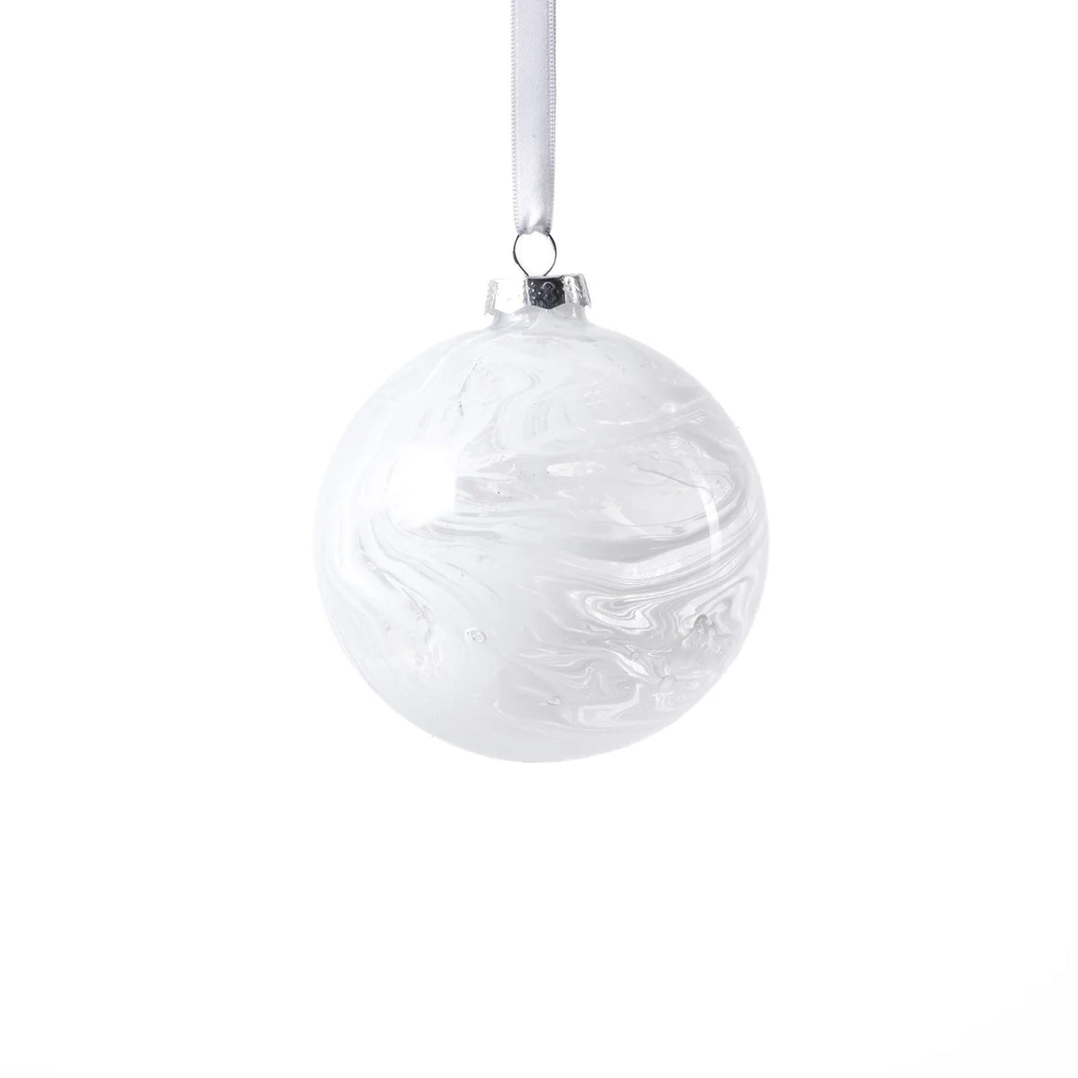 The ZODAX WATERCOLOR GLASS ORNAMENT IN WHITE is a round, marbled 4-inch Christmas ornament suspended by a thin silver ribbon against a plain white background.