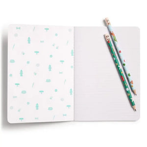 The E. FRANCES - STITCHED NOTEBOOKS OFF LEASH, SET OF 2 by E. FRANCES PAPER features one notebook with green stripes and a dog illustration, and another adorned with playful pups—perfect for pet lovers’ stationery needs.