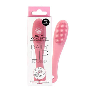 The Daily Concepts LIP SCRUBBER is a pink silicone facial cleansing brush designed with a textured bristle surface on one end and a convenient hole in the handle for hanging. This multifunctional, silicone-based brush features an oval cleansing head and an ergonomically curved handle, making it perfect for both effective facial cleansing and smooth, exfoliated lips.