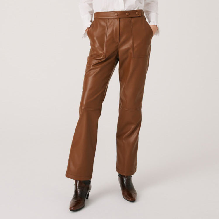 A solid dark gray rectangle with a slightly uneven texture. The color is consistent throughout, with no distinct patterns or shapes visible, reminiscent of the sleek finish on the SFIZIO - ECO LEATHER PANT made by SFIZIO in Italy.