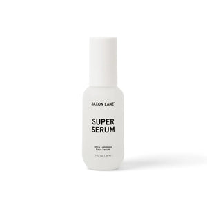 A white bottle labeled "JAXON LANE - SUPER SERUM ULTRA LUMINOUS FACE SERUM FOR MEN," 1 fl oz / 30 ml, with a white cap stands upright on a plain white background—ideal for men seeking a brightening serum with niacinamide.