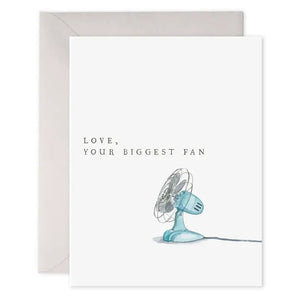 The E. FRANCES - BIGGEST FAN CARD by E. FRANCES PAPER is a watercolor greeting card featuring a charming illustration of a blue electric fan with the message "LOVE, YOUR BIGGEST FAN" printed above it. The card comes with an envelope placed behind it, making it the perfect just because card to let someone know you care. Proudly made in the USA.