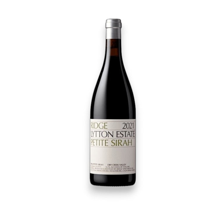 A bottle of RIDGE LYTTON SPRINGS PETITE SIRAH 2021. Created by Winebow in Sonoma County, it features a dark glass with a silver foil top, and a white label highlighting the winery's name and vintage in elegant black and gold lettering, offering ripe blackberry notes and a lengthy finish.