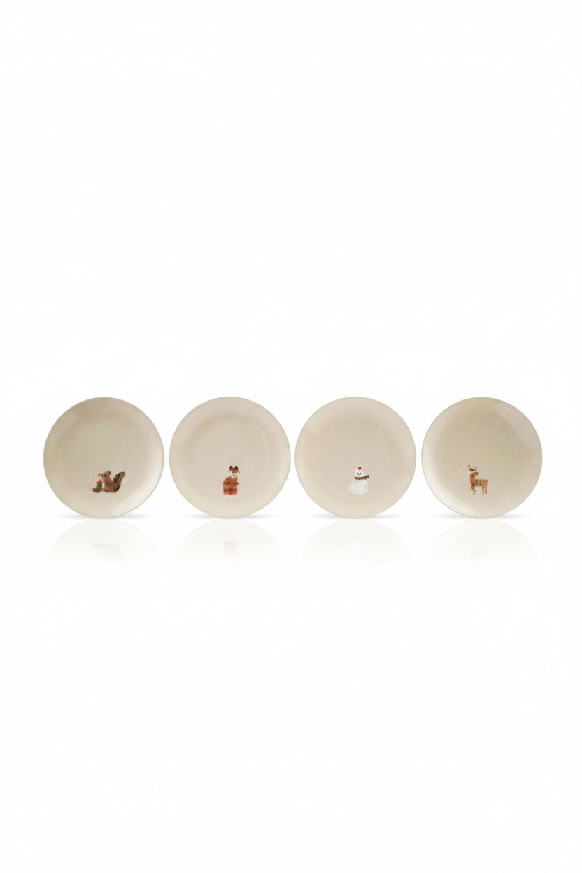 Four small, off-white PLATE WITH HOLIDAY ANIMAL stoneware dessert plates, each decorated with a different character wearing festive accessories: a squirrel, a fox, a snowman, and a deer.
