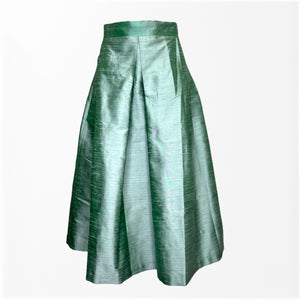 Introducing the MIDI STRUCTURED SKIRT by ALYKI LABORATORIO, a high-waisted A-line skirt that showcases a striking abstract floral pattern in vibrant shades of pink and red on a cream backdrop. Crafted in Italy, this voluminous piece features soft, elegant pleats for a refined yet bold look.