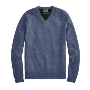 The MACK WELDON Tech Cashmere V Neck Sweater in Navy is laid flat on a white background, showcasing its ribbed collar, cuffs, and hem, along with a subtle heathered texture for style and comfort.