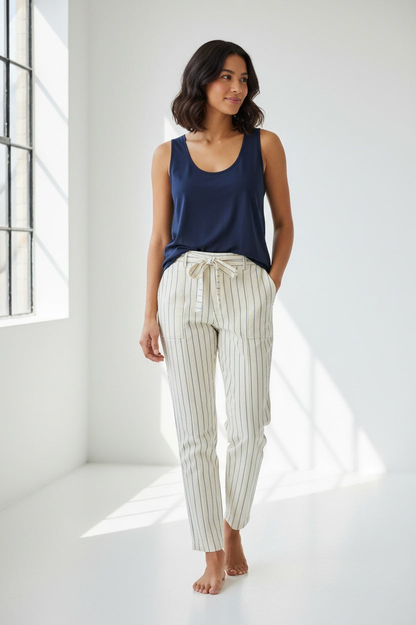 A plain, solid coral-colored square that evokes the perfection of a HINSON WU - DAPHNE SCOOP NECK TANK, featuring a tailored design without patterns or extra elements.