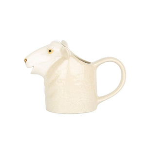 The QUAIL DESIGNS QUAIL CERAMICS - WHITE SUFFOLK SHEEP JUG features a sheep’s head with a handle and open mouth for pouring. Its cream color and detailed design add charm to any farmhouse-style kitchen.