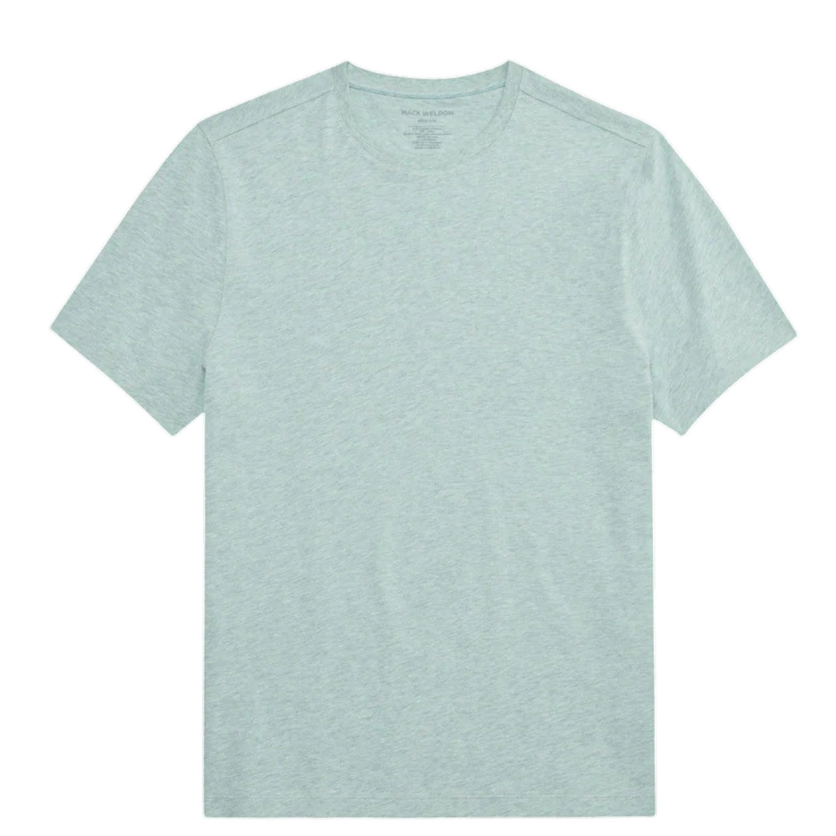 A man with short hair stands with his back to the camera, wearing the MACK WELDON Slub Cotton Crew Neck T-Shirt in Nile Blue Heather and dark pants. His hands are in his pockets as he glances over his left shoulder.