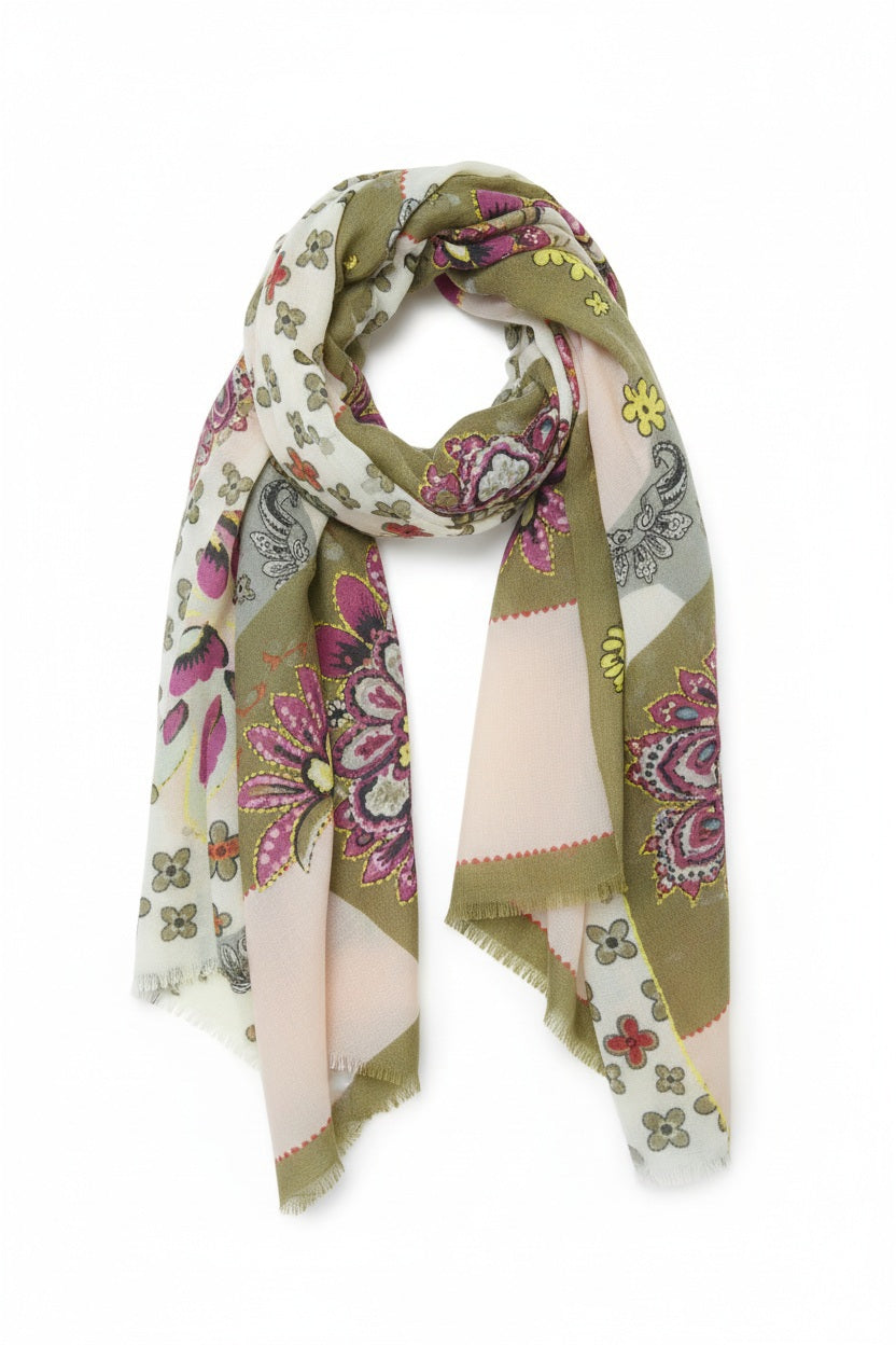The STORIATIPIC - ARIANE WOOL SCARF WITH EMBROIDERY IN ROSE is a lightweight wool scarf in olive green, cream, and pink tones, adorned with floral and paisley patterns, and shown loosely draped in a loop on a white background.