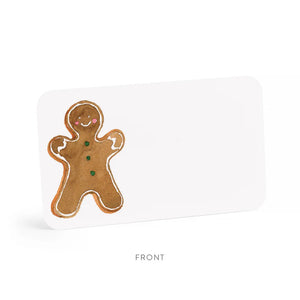 A transparent box contains 85 GINGERBREAD LITTLE NOTES, with the top notecard featuring a gingerbread man illustration, including a smiling face and three green buttons. A label on the box reads "E.FRANCES PAPER 85 Little Notes—use unsparingly.