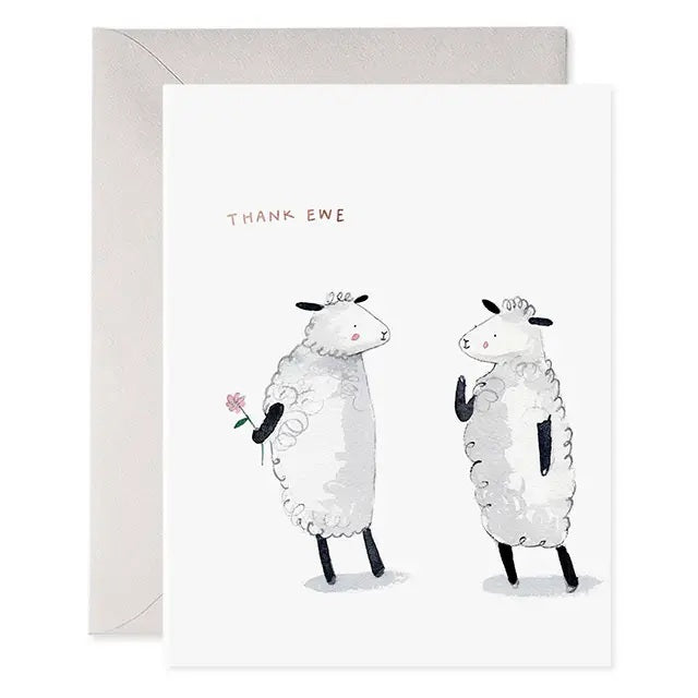 Featuring a delightful watercolor illustration of two upright sheep, with one presenting a flower to the other, the E. FRANCES - THANK EWE CARD by E. FRANCES PAPER comes paired with a light grey envelope and displays "E. Frances" branding at the bottom. Made in the USA.