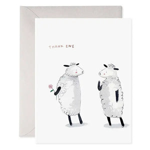 Featuring a delightful watercolor illustration of two upright sheep, with one presenting a flower to the other, the E. FRANCES - THANK EWE CARD by E. FRANCES PAPER comes paired with a light grey envelope and displays "E. Frances" branding at the bottom. Made in the USA.