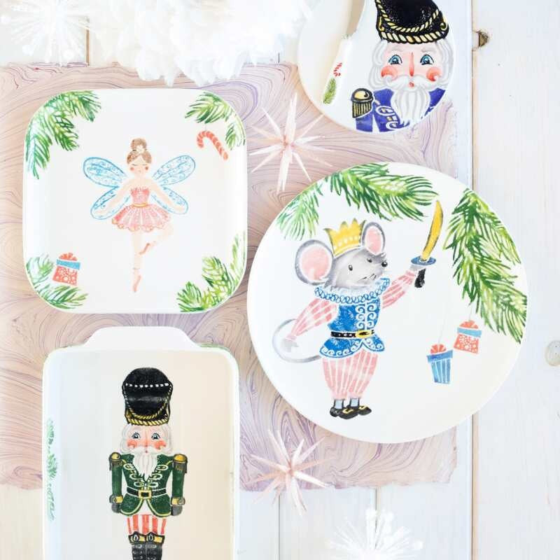 VIETRI NUTCRACKERS SUGAR PLUM FAIRY SQUARE PLATTER featuring a hand-painted Sugar Plum Fairy, evergreen branches, a candy cane, and a gift box.