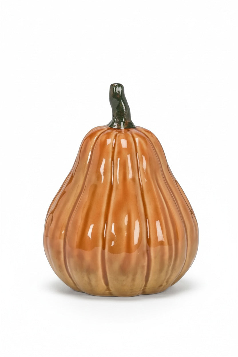 Three glazed ceramic pumpkins of varying shapes and sizes with dark green stems, including one TALL CERAMIC PUMPKIN by ABBOTT.